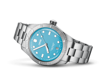 Oris Divers Sixty-Five Cotton Candy Unisex 01 733 7771 4055-07 8 19 18 horloge 38mm met turquoise wijzerplaat en roestvrijstalen band. Luxe Swiss Made heren horloge geschikt voor dames en heren.