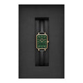 Daniel Wellington DW00100439 dameshorloge met rechthoekige groene wijzerplaat en zwarte leren band, elegant verpakt in zwarte doos. Luxe dameshorloge 20x32 mm.