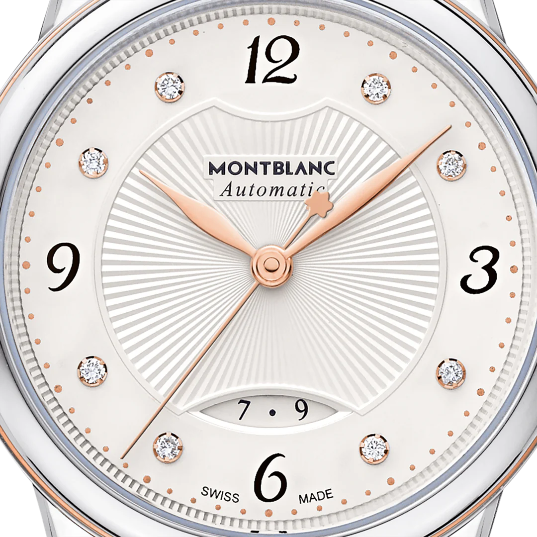 Montblanc Bohème Date Automatic ref:111058 dameshorloge 30mm met roségoud en zilveren schakelband, elegante wijzerplaat met datumfunctie.