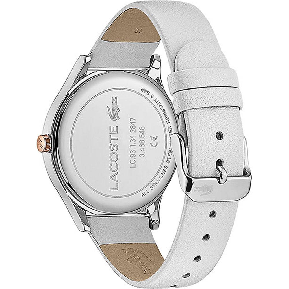 Lacoste Nikita dameshorloge 38mm met witte leren band en parelmoer wijzerplaat, stijlvol en elegant voor modebewuste vrouwen.