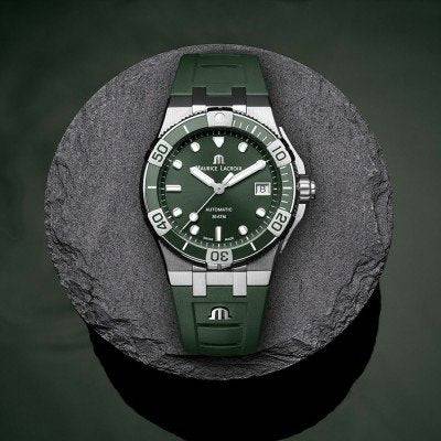 Aikon Automatic Venturer - Maurice Lacroix herenhorloge 43mm met groene wijzerplaat en rubberen band, waterdicht tot 30 ATM.