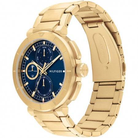 Tommy Hilfiger TH1792118 LORENZO herenhorloge 44mm met goudkleurige roestvrijstalen band en blauwe wijzerplaat. Luxe accessoire voor herenmode.